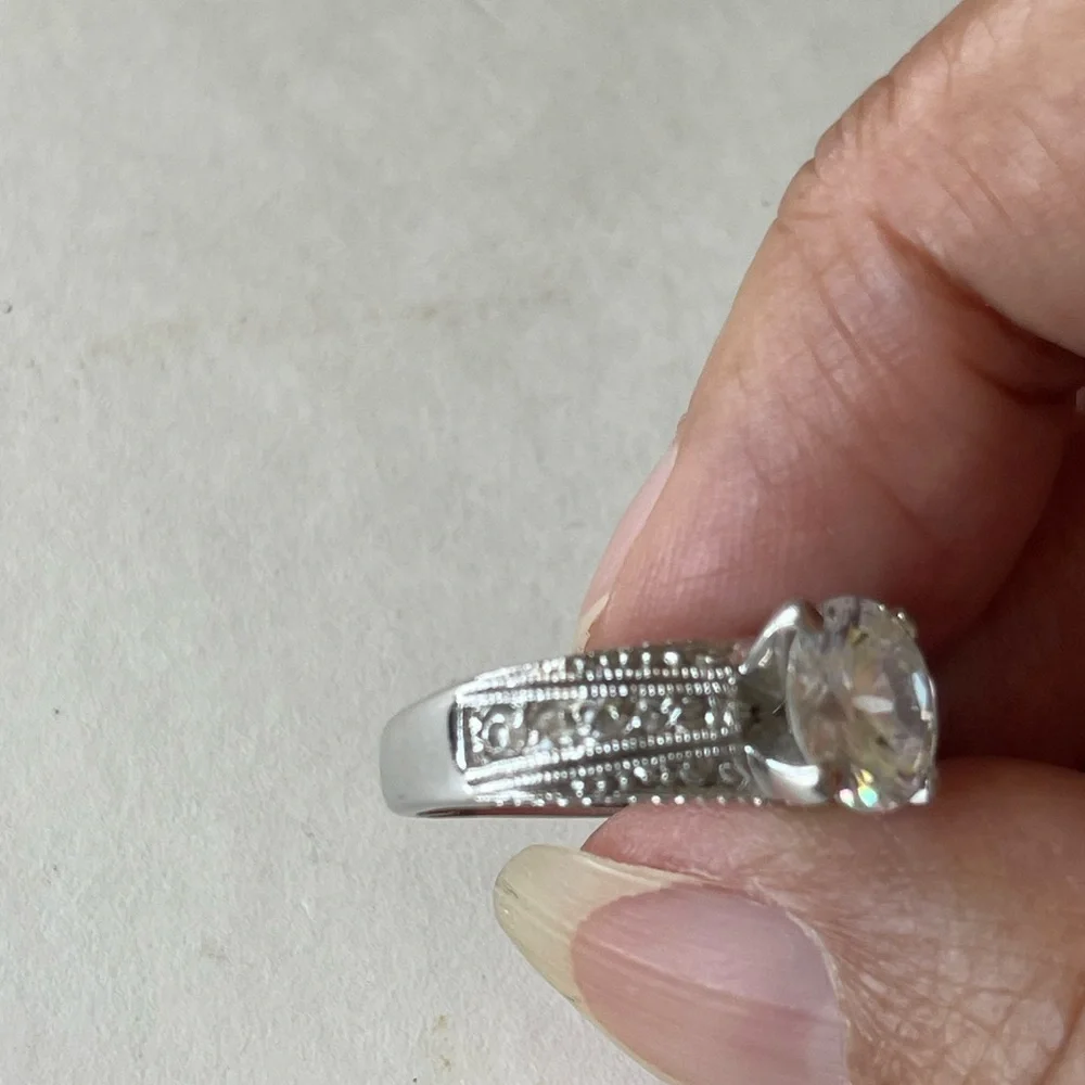 Silver and White Ring with Clear Gemstone and Milgrain Detailing - Picture 2 of 3